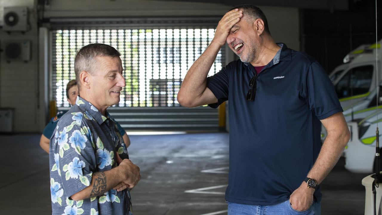 Shark Attack survivor Rick Bettua and reunites with one of his rescuer Bastien Iezzi. Picture: Lachie Millard