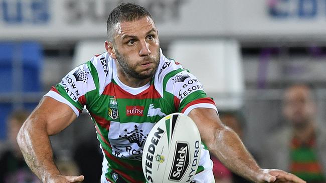 Robbie Farah of the Rabbitohs passes the ball during the Round 14 NRL match between the Gold Coast Titans and the South Sydney Rabbitohs at CBUS Super Stadium at Robina on the Gold Coast, Friday, June 8, 2018. (AAP Image/Dave Hunt) NO ARCHIVING, EDITORIAL USE ONLY