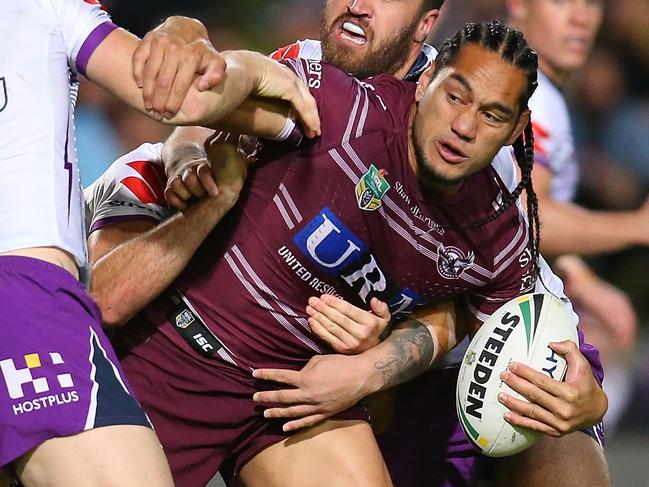 SYDNEY, AUSTRALIA - JULY 14:  Martin Taupau of the Sea Eagles is tackled during the round 18 NRL match between the Manly Sea Eagles and the Melbourne Storm at Lottoland on July 14, 2018 in Sydney, Australia.  (Photo by Jason McCawley/Getty Images)