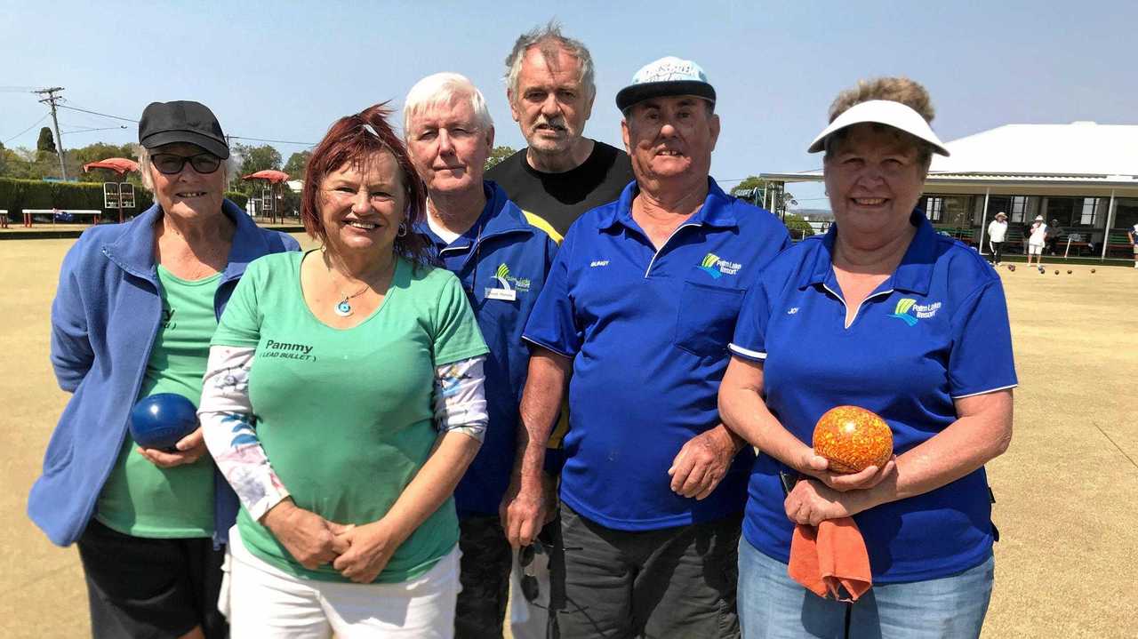 Mary Galloway, Pam Walker, David Harvey, Angus Walker, Bungy and Joy Williams on the green. Picture: Jessica McGrath