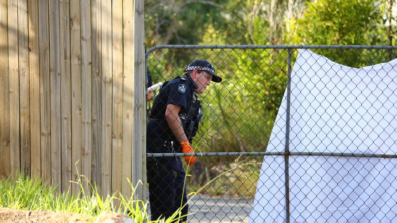 Police at the scene of a fatal dog mauling at Greenbank. Picture David Clark