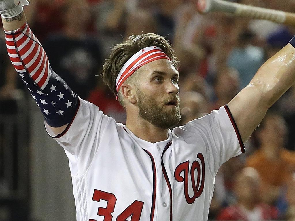 WASHINGTON, DC - JULY 16: Bryce Harper of the Washington Nationals and National League hits his final home run to win the T-Mobile Home Run Derby at Nationals Park on July 16, 2018 in Washington, DC. Harper defeated Kyle Schwarber of the Chicago Cubs and National League 19-18.   Patrick Smith/Getty Images/AFP == FOR NEWSPAPERS, INTERNET, TELCOS & TELEVISION USE ONLY ==