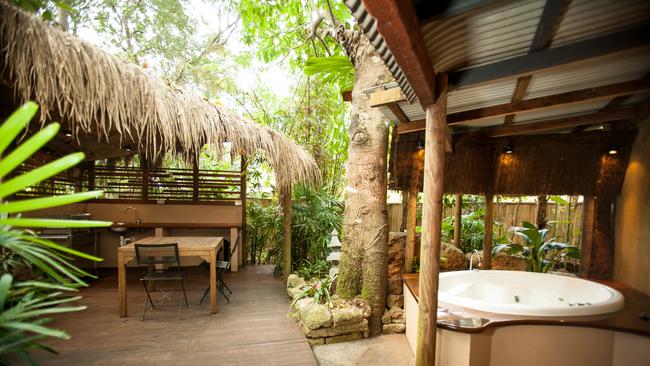 Outdoor bathrooms let the rainforest in at Mount Tamborine's Witches Falls Cottages.