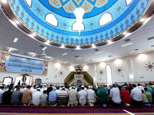 Members of the Muslim community attend Midday Prayer is held at Lakemba Mosque Open Day as part of the National Mosque Open Day.Picture: Richard Dobson