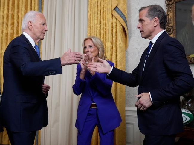 US President Joe Biden has pardoned his son Hunter Biden, right. Picture: AFP