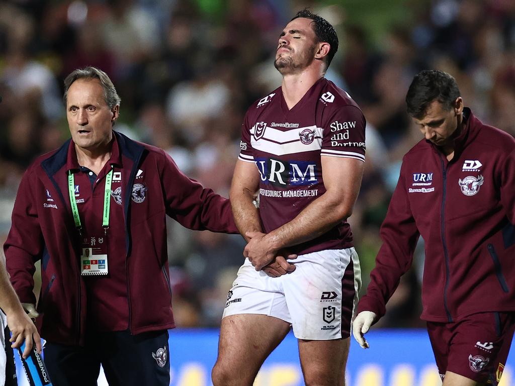 Morgan Boyle of the Sea Eagles walks off the field after dislocating his shoulder. Picture: Cameron Spencer/Getty Images