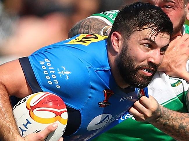 CAIRNS, AUSTRALIA - OCTOBER 29:  James Tedesco of Italy runs the ball during the 2017 Rugby League World Cup match between Ireland and Italy at Barlow Park on October 29, 2017 in Cairns, Australia.  (Photo by Chris Hyde/Getty Images)