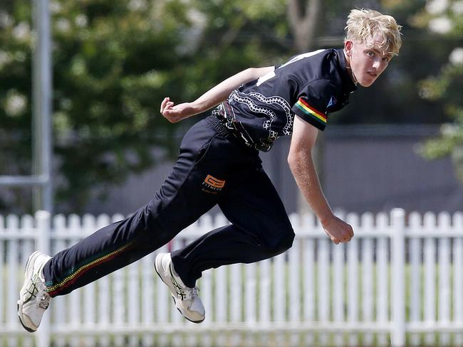 Penrith's Archer Sproule gets airbourne while bowling. Picture: John Appleyard