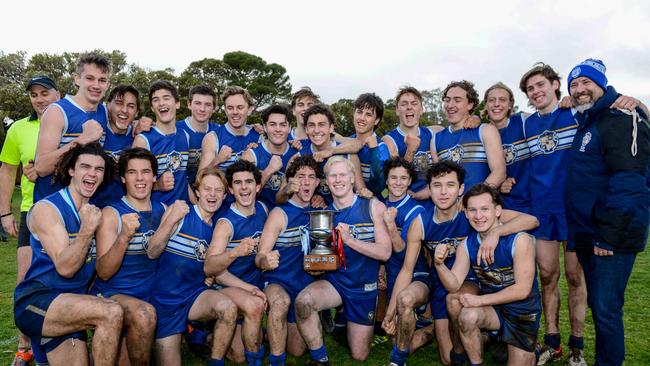 Sacred Heart players celebrate Saturday’s intercol win over traditional rival Rostrevor. Picture: AAP/Brenton Edwards