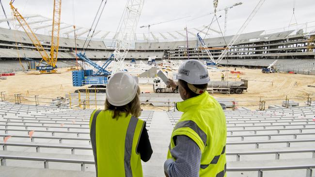 WA Sports Minister Mia Davies and Projector Director for Department of Sport and Recreation, Ronnie Hurst, inspecting the under-construction Perth Stadium in July.