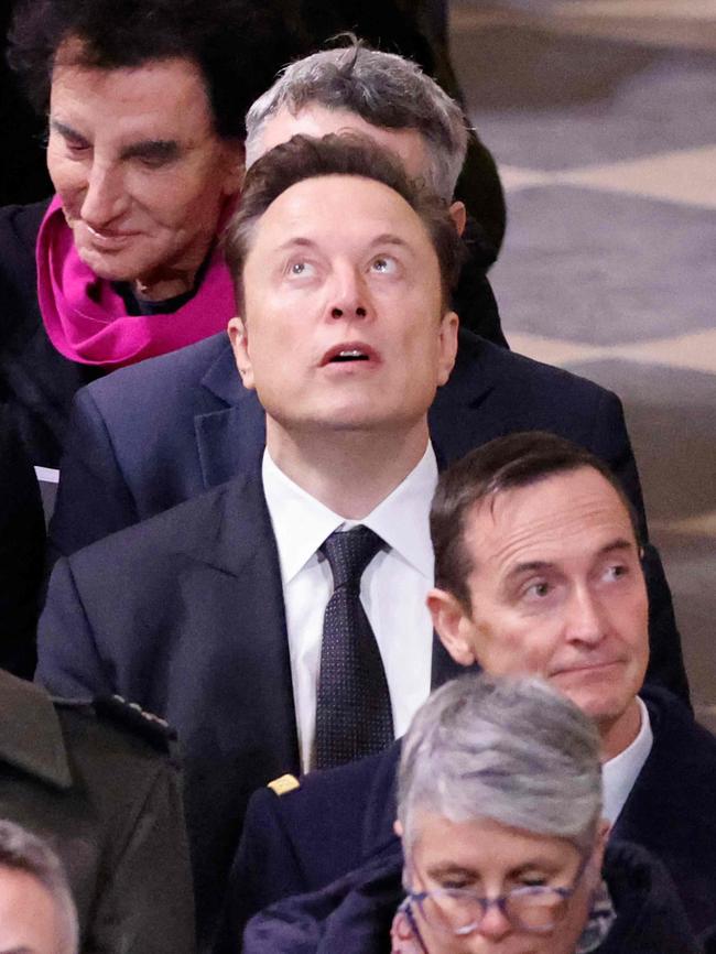 The Tesla and SpaceX CEO admires the historic restoration of the Notre Dame Cathedral. Picture: AFP