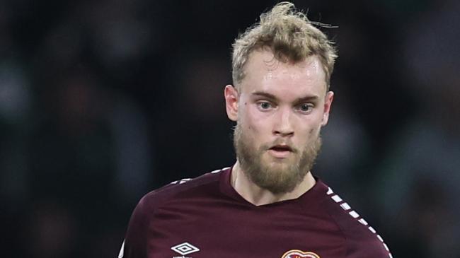 GLASGOW, SCOTLAND - DECEMBER 16: Nathaniel Atkinson of Hearts controls the ball during the Cinch Scottish Premiership match between Celtic FC and Heart of Midlothian at Celtic Park Stadium on December 16, 2023 in Glasgow, Scotland. (Photo by Ian MacNicol/Getty Images)