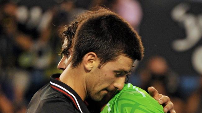 Novak Djokovic (L) embraces Rafael Nadal after their epic 2012 Australian Open final. Picture: AFP