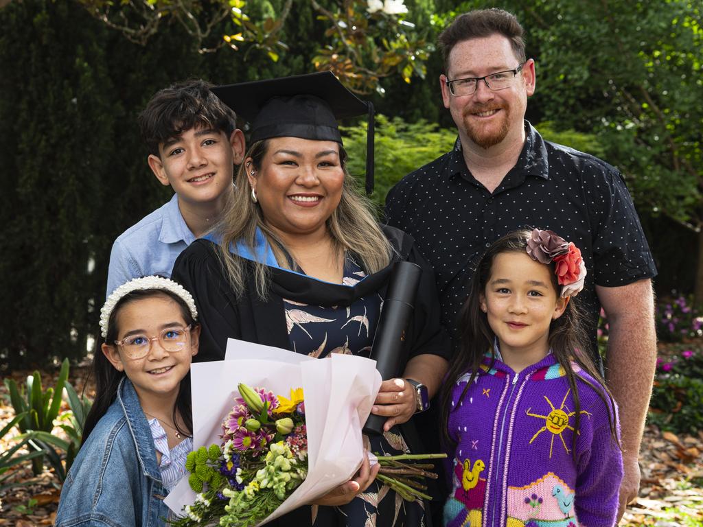 Master of Science graduate Maria Gagarin with son Christian Miller, husband Timothy Miller, daughters Olivia (left) and Sophia Miller at a UniSQ graduation ceremony at The Empire, Wednesday, October 30, 2024. Picture: Kevin Farmer