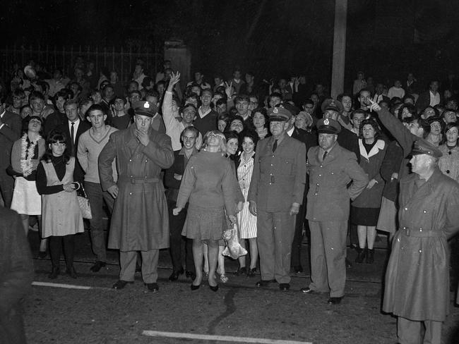 29/6/1964 Crowds of fans waiting outside Lennons Hotel for The Beatles to arrive. Picture: News Corp