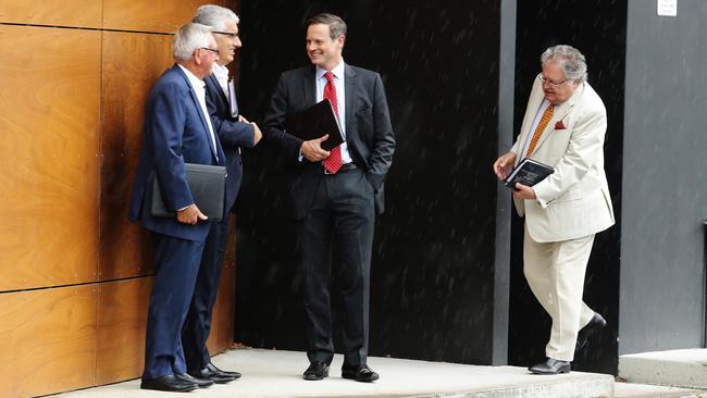 Manly owner Scott Penn, centre, with fellow club chairmen, leave after their controversial NRL meeting at League Central last week. Picture: Brett Costello