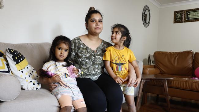 Mum Ridae Fatima with her daughters Emama Ali Rizvi and Aaira Fatima, at their home in Bass Hill. Picture: Richard Dobson