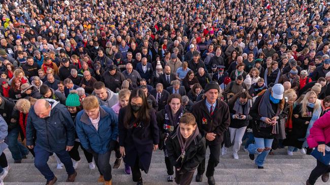 Crowds mount the steps to the Shrine after Dawn Service. Picture: Getty Images