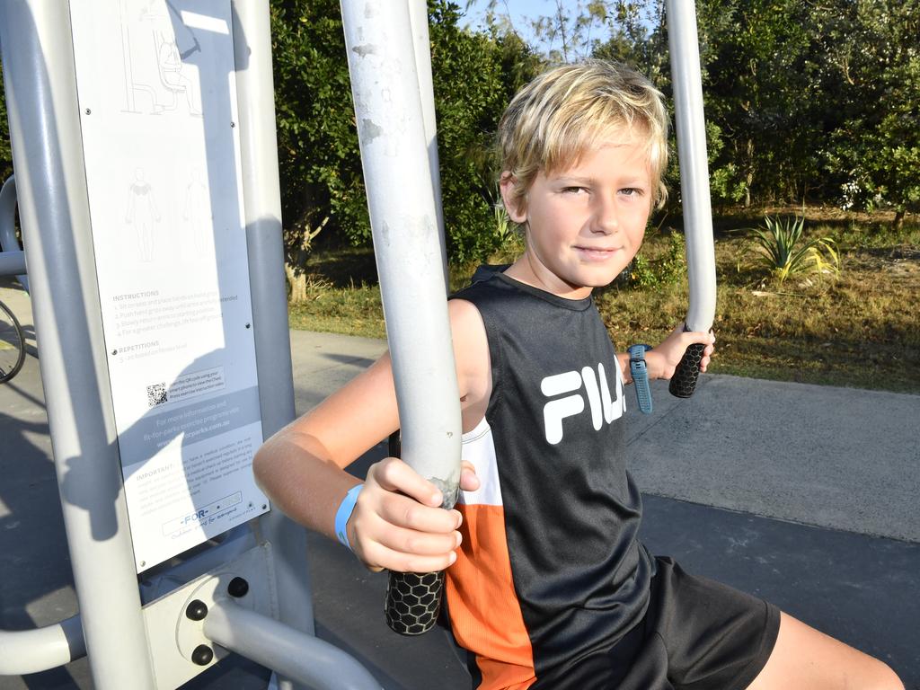 Reef Crofton, 9 gets in a warmup before the Yamba Triathlon Fun Run