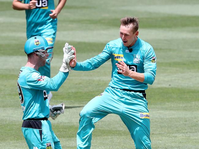 ADELAIDE, AUSTRALIA - JANUARY 26: Marnus Laubuschagne of the Heat celebrates the wicket of Jhye Richardson of the Scorchers with Jimmy Peirson during the Big Bash League match between the Brisbane Heat and Perth Scorchers at Adelaide Oval on January 26, 2021 in Adelaide, Australia. (Photo by Sarah Reed/Getty Images)