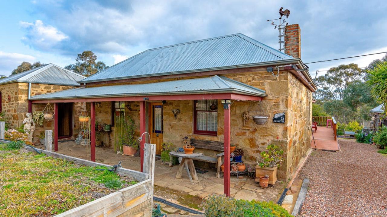 The stone cottage dates back more than 150 years.