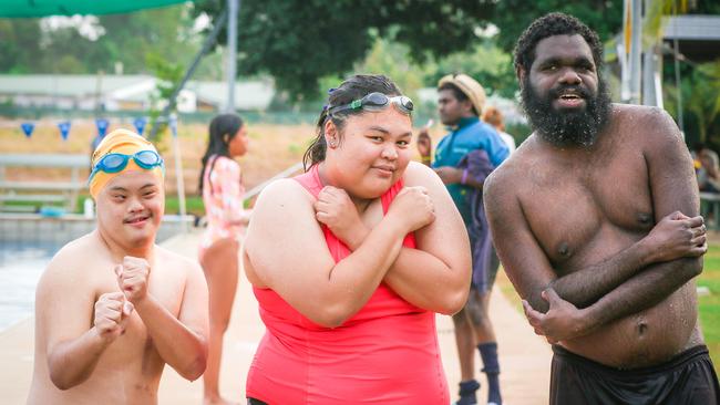 Darwin swimmers shivering at the thought of going to Launceston for the Special Olympics Special Olympics special Olympics are Jonathan Tan, Maria Pitt and Donovan Mota. Picture: Glenn Campbell