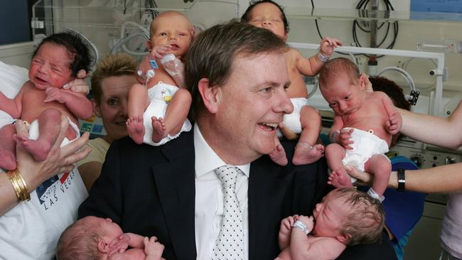 Peter Costello with new born babies at Royal Women's Hospital.