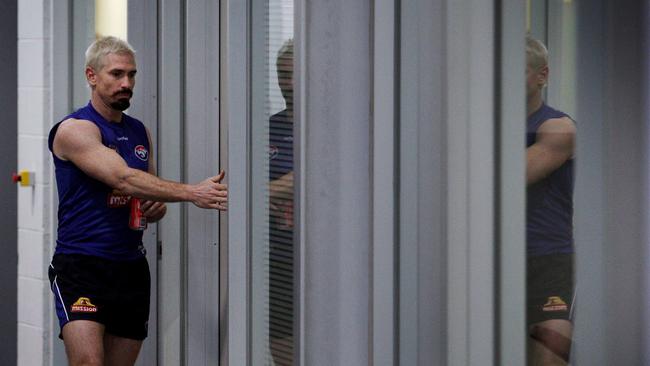 Jason Akermanis enters the office of coach Rodney Eade where he was moments later told he has been sacked. Picture: Michael Klein.