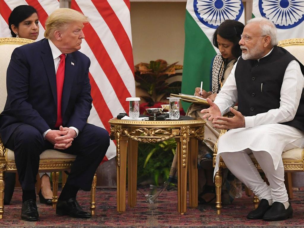 India's Prime Minister Narendra Modi (R) speaks during a meeting with US President Donald Trump at Hyderabad House in New Delhi. Picture: AFP