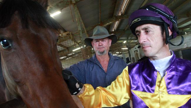 RACING ALL-ROUNDER: In 2013, John Rowan was vocal about a shortage of riders threatening the Far Northern racing industry. He is pictured with jockey Kirk Stone.