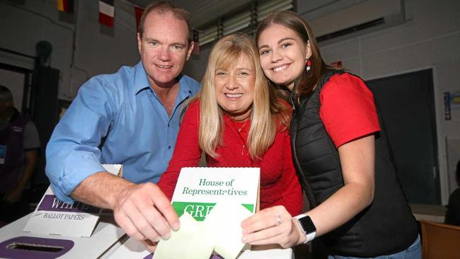 Craig Elliot, Richmond MP Justine Elliot and their daughter Alex cast their votes. Picture: Scott Powick