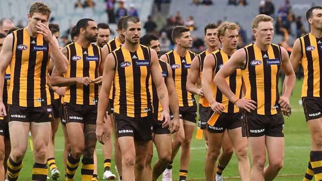 The Hawks react after the Round 2 AFL match between the Hawthorn Hawks and the Western Bulldogs at the MCG in Melbourne, Sunday, March 31, 2019. (AAP Image/Julian Smith) NO ARCHIVING, EDITORIAL USE ONLY
