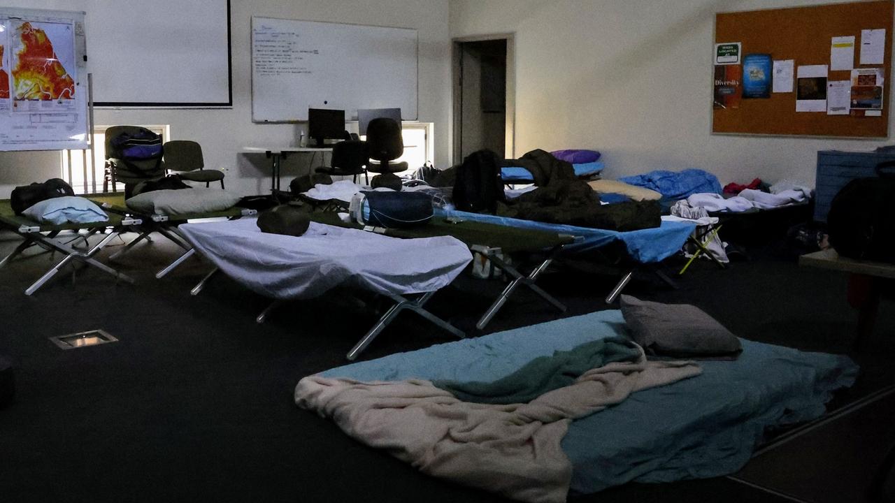 Cairns council officers have been working around the clock and sleeping in shifts at the Cairns Local Disaster Coordination Centre, Woree, as Tropical Cyclone Jasper approaches the Far North Queensland coast. Picture: Brendan Radke