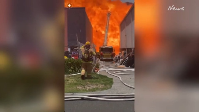 Moment inferno explodes from Dandenong paint factory