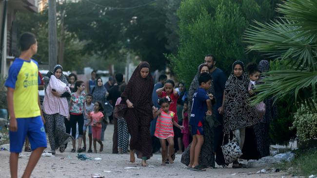 Palestinian families flee their homes following an Israeli attack on the Rafah refugee camp. Picture: AFP