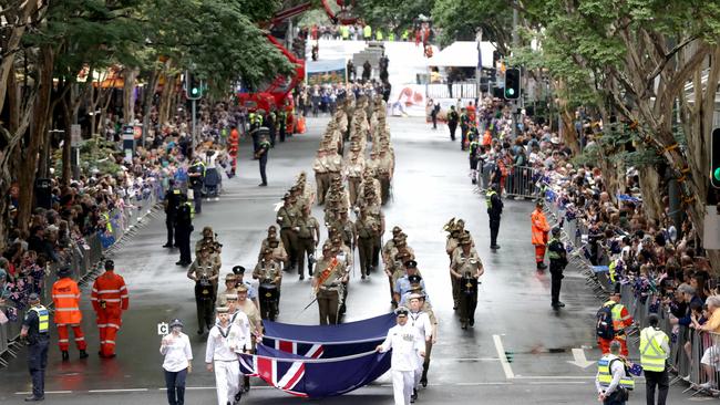 Marching down Adelaide St, during the Anzac Day Parade, Brisbane City. Photo: Steve Pohlner