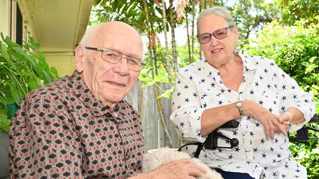 Maggie and Jim Copp at their retirement complex in Smithfield with faithful companion Bailey are grateful for the level of care they received from the Cairns Hospital Virtual Covid Ward. Picture: Emily Barker.