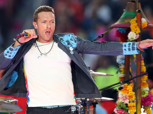 SANTA CLARA, CA - FEBRUARY 07: Chris Martin of Coldplay performs during the Pepsi Super Bowl 50 Halftime Show at Levi's Stadium on February 7, 2016 in Santa Clara, California. (Photo by Streeter Lecka/Getty Images)