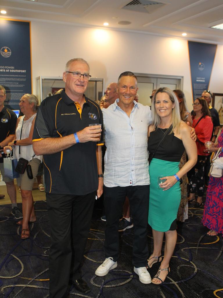 Southport SLSC 100th birthday celebrations. Bill Gordon- Thomson, Dean Mahoney, Kate Mahoney. 19 October 2024 Main Beach Picture by Richard Gosling