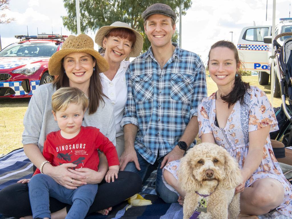 ( From left ) Theodre, Laura, Elinor and Tom Barry with Heather McInherney and Melody the dog, all out in force to watch Alex Barry play for QPS. Brett Forte Super 10s Memorial Rugby Challenge. QPS vs The Army. Saturday, August 14, 2021. Picture: Nev Madsen.