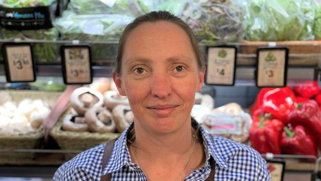 Blake Family Grocers Daylesford employee Leah Walters stocks the shelves. Picture: Timothy Cox. .