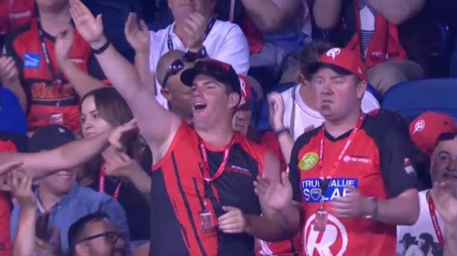 A Melbourne Renegades fan appears to make a white power salute after a Cameron White four against the Stars.