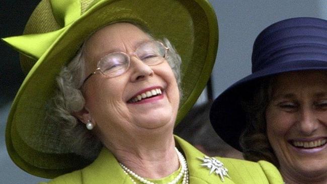 The Queen, pictured here laughing at the Derby. Picture: Arthur Edwards.