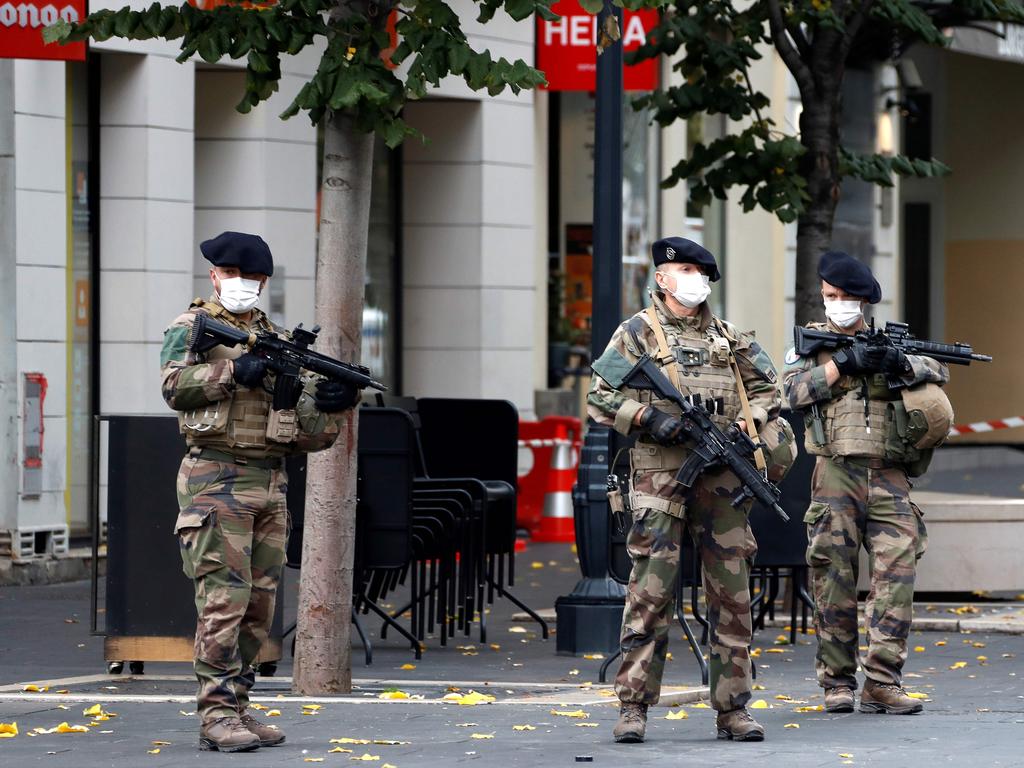 French soldiers secure the Basilica of Notre-Dame de Nice after the attack. Picture: Eric Gaillard/AFP