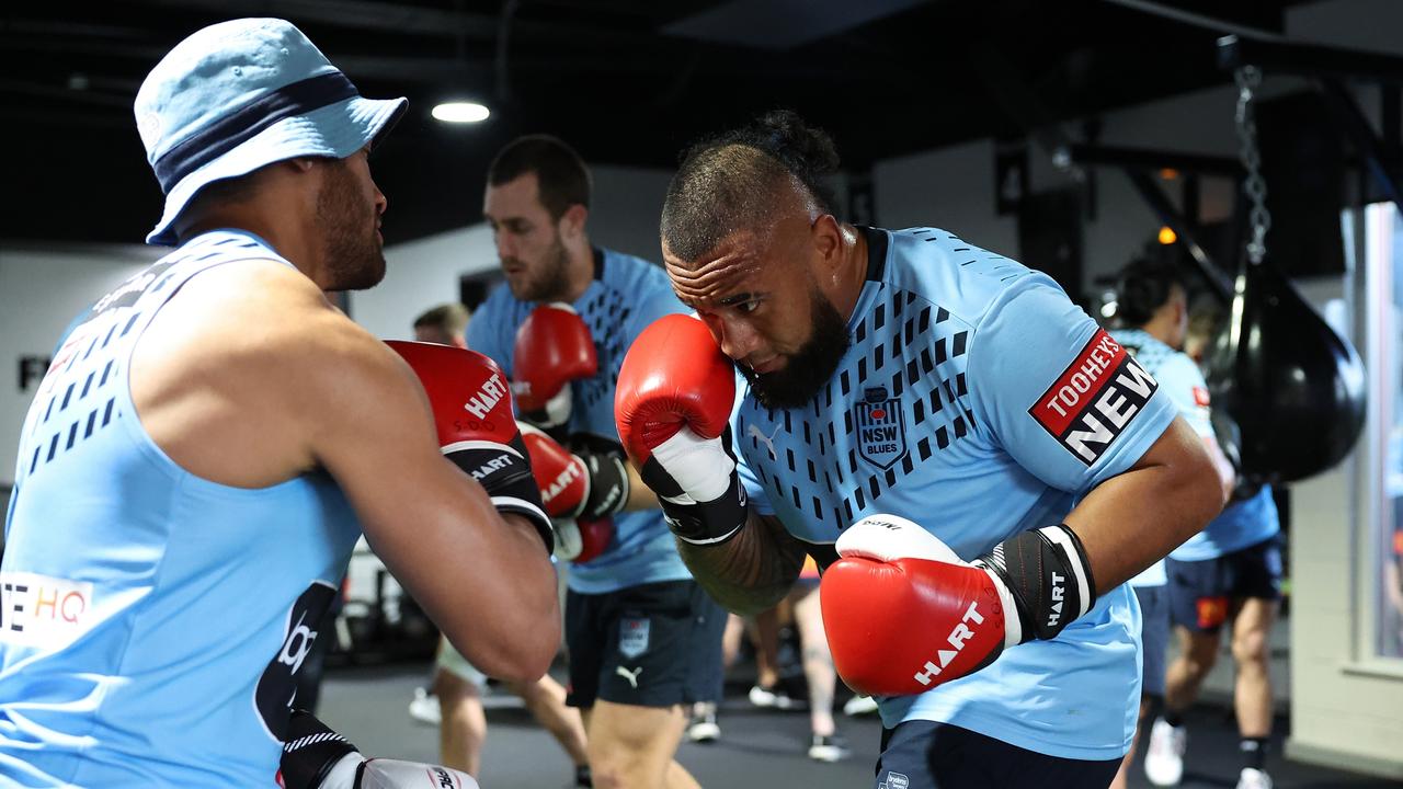 Junior Paulo works the pads at NSW training last year. Picture: Getty