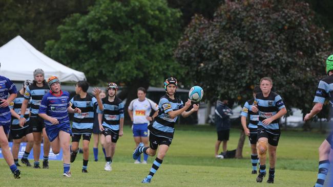 Day 1 of the King of the Country junior rugby union tournament at the Gold Coast Eagles Rugby Union Club.Maroochydore Swans (BLUE AND BLACK) vs USQ Saints (Blue ) Maroochydore Player No10 Luke Sparke USQ Player No Pic Mike Batterham