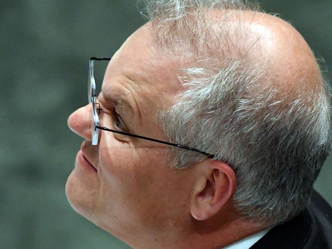 CANBERRA, AUSTRALIA - MAY 12: Prime Minister Scott Morrison during Question Time in the House of Representatives at Parliament House on May 12, 2021 in Canberra, Australia. The Morrison government's third budget, handed down on Tuesday, has an increased focus on women, with almost $354 million in funding allocated for women's health. Treasurer Josh Frydenberg also outlined more than $10 billion in spending on major infrastructure projects across Australia aimed to help create local jobs and boost productivity in the COVID-affected national economy. Aged care will receive more than $10 billion over the next four years, in direct response to the findings of the Royal Commission into Aged Care Quality and Safety. (Photo by Sam Mooy/Getty Images)