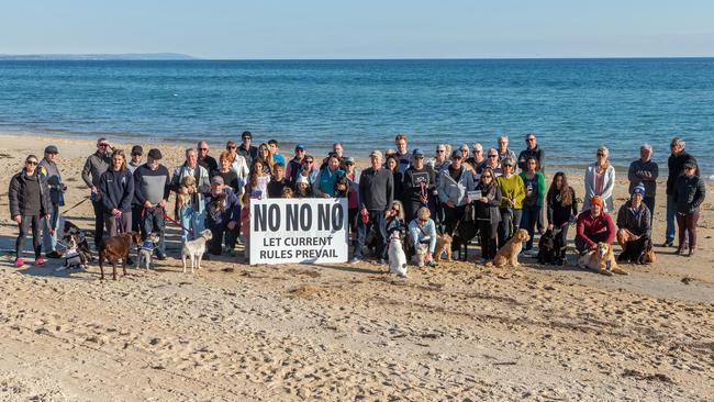 Protesters and their dogs took to Edithvale beach to voice their concerns over leash-free plans.