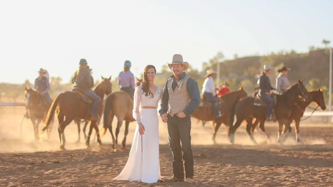 Fred Osman and Kyla Dolen celebrating a rodeo romance for the ages at Mount Isa Mines Rodeo. Picture: Pete Wallis