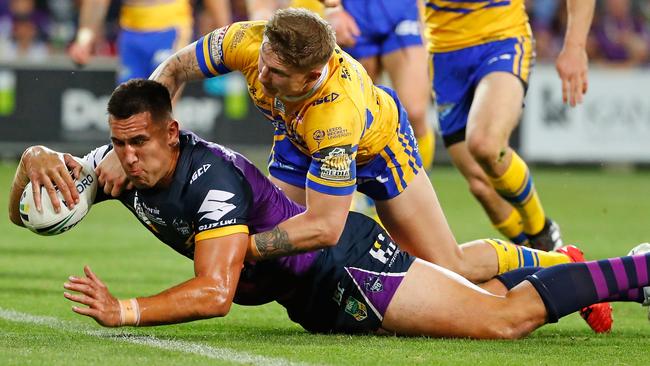 Nelson Asofa-Solomona scores a try for the Storm.